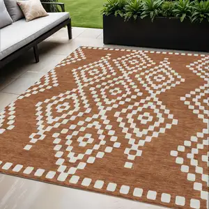 Photo of Terra Cotta And Ivory Geometric Washable Indoor Outdoor Area Rug