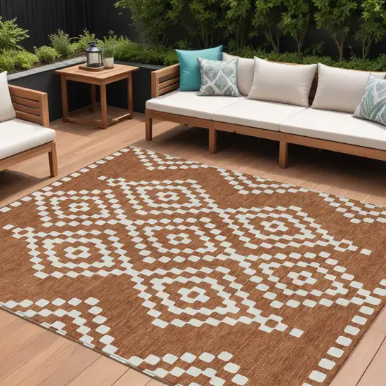 Terra Cotta And Ivory Geometric Washable Indoor Outdoor Area Rug Photo 1