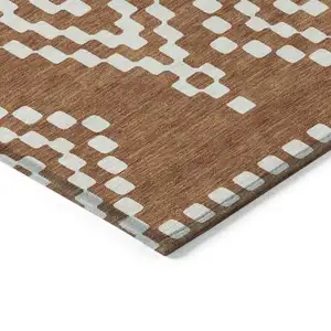 Photo of Terra Cotta And Ivory Geometric Washable Indoor Outdoor Area Rug
