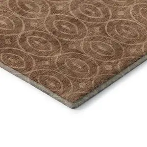 Photo of Terra Cotta And Rust Geometric Washable Area Rug With UV Protection