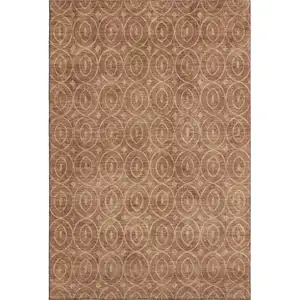 Photo of Terra Cotta And Rust Geometric Washable Area Rug With UV Protection