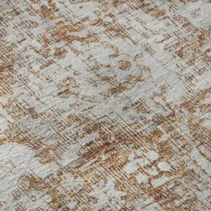 Photo of Terra Cotta And Silver Oriental Washable Area Rug With UV Protection