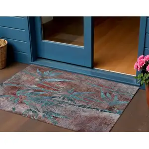 Photo of Terra Cotta And Teal Blue Botanical Leaves Washable Indoor Outdoor Area Rug