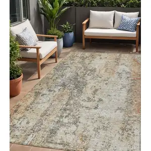 Photo of Terra Cotta Beige And Dark Gray Abstract Washable Indoor Outdoor Area Rug