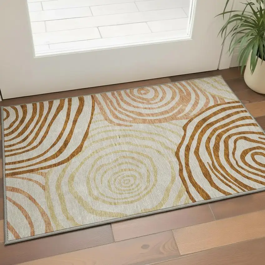 Terra Cotta Beige And Gold Abstract Washable Area Rug With UV Protection Photo 2