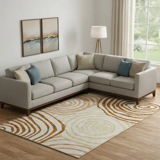 Terra Cotta Beige And Gold Abstract Washable Area Rug With UV Protection Photo 1