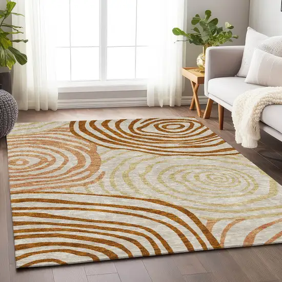 Terra Cotta Beige And Gold Abstract Washable Area Rug With UV Protection Photo 4