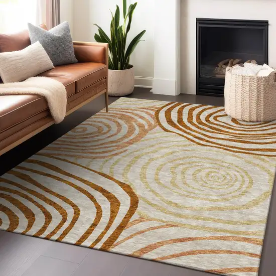 Terra Cotta Beige And Gold Abstract Washable Area Rug With UV Protection Photo 5
