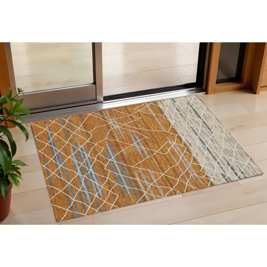 Terra Cotta Beige And Ivory Striped Washable Indoor Outdoor Area Rug Photo 1