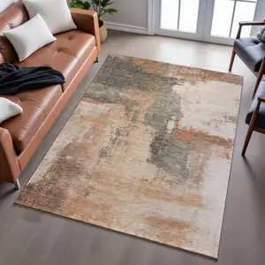 Photo of Terra Cotta Beige And Sage Abstract Washable Area Rug With UV Protection