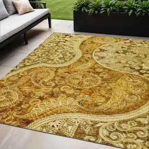 Photo of Terra Cotta Brown And Gold Floral Medallion Washable Indoor Outdoor Area Rug