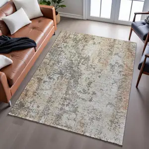 Photo of Terra Cotta Brown And Gray Abstract Washable Area Rug With UV Protection
