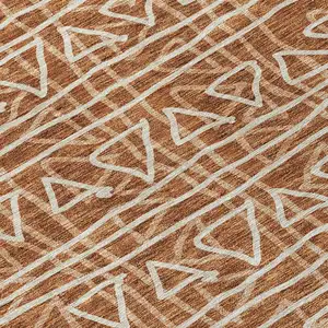 Photo of Terra Cotta Copper And Beige Geometric Washable Indoor Outdoor Area Rug