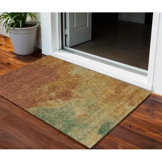 Terra Cotta Copper And Green Abstract Washable Indoor Outdoor Area Rug Photo 1