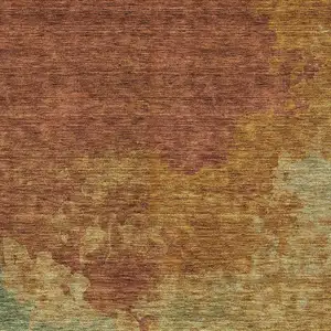Photo of Terra Cotta Copper And Green Abstract Washable Indoor Outdoor Area Rug