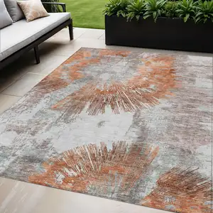 Photo of Terra Cotta Copper And Taupe Abstract Washable Indoor Outdoor Area Rug
