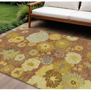 Photo of Terra Cotta Gold And Beige Floral Washable Indoor Outdoor Area Rug