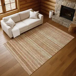 Photo of Terra Cotta Gold And Beige Striped Washable Area Rug With UV Protection