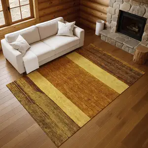 Photo of Terra Cotta Gold And Brown Striped Washable Area Rug With UV Protection