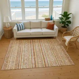 Photo of Terra Cotta Gold And Gray Striped Washable Area Rug With UV Protection