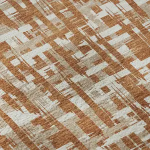 Photo of Terra Cotta Ivory And Beige Abstract Geometric Washable Area Rug With UV Protection
