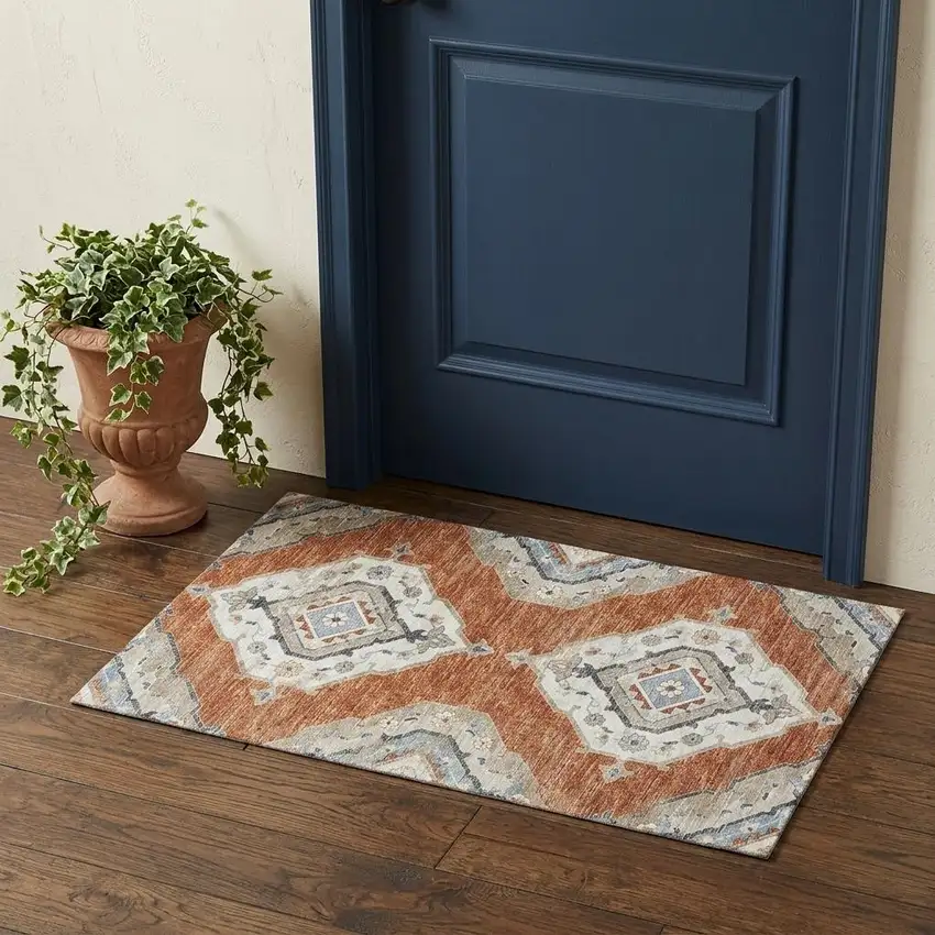 Terra Cotta Ivory And Blue Tribal Distressed Washable Area Rug With UV Protection Photo 1