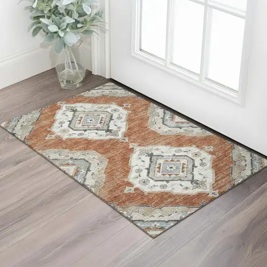 Terra Cotta Ivory And Blue Tribal Washable Area Rug With UV Protection Photo 1