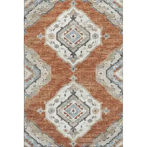 Photo of Terra Cotta Ivory And Blue Tribal Washable Area Rug With UV Protection