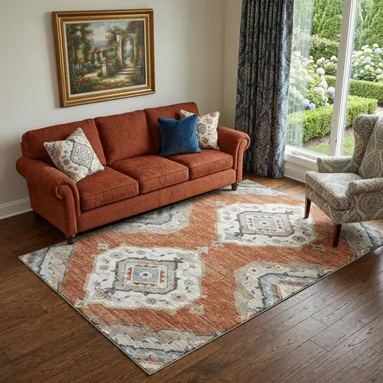 Terra Cotta Ivory And Blue Tribal Distressed Washable Area Rug With UV Protection Photo 1