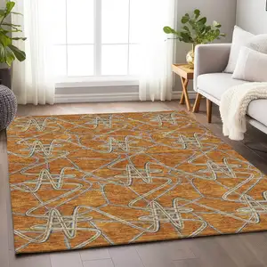 Photo of Terra Cotta Ivory And Gray Geometric Washable Area Rug With UV Protection