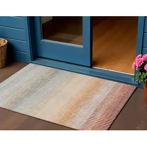 Photo of Terra Cotta Orange And Gray Striped Washable Indoor Outdoor Area Rug