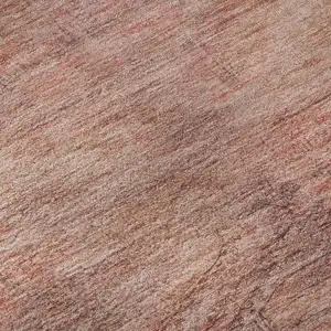 Photo of Terra Cotta Salmon And Blush Abstract Geometric Washable Area Rug With UV Protection