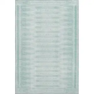 Photo of Turquoise And Aqua Geometric Washable Area Rug With UV Protection