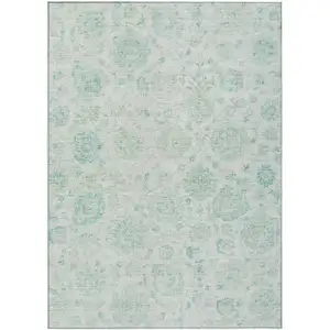 Photo of Turquoise And Beige Damask Washable Indoor Outdoor Area Rug