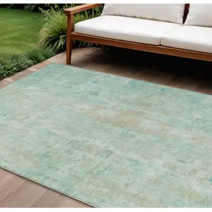 Photo of Turquoise And Copper Abstract Washable Indoor Outdoor Area Rug