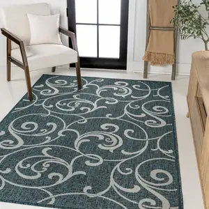 Photo of Turquoise And Cream Floral Indoor Outdoor Area Rug