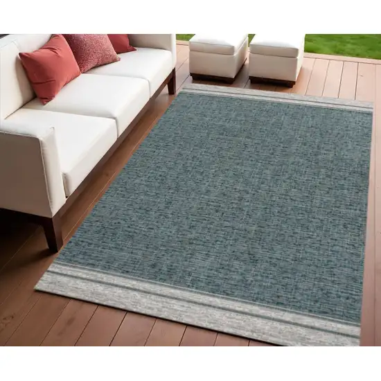 Turquoise And Cream Indoor Outdoor Area Rug Photo 1