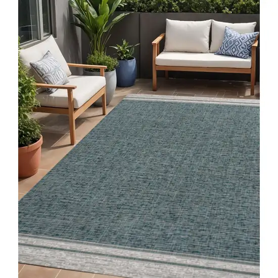Turquoise And Cream Indoor Outdoor Area Rug Photo 1