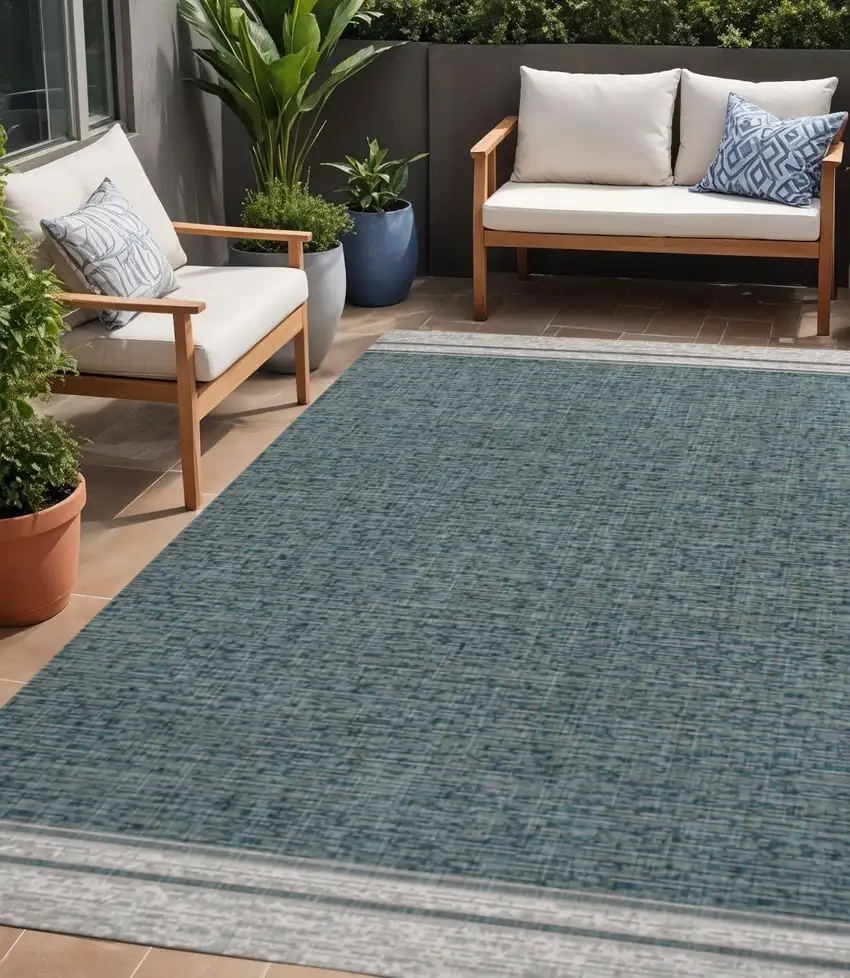 Turquoise And Cream Indoor Outdoor Area Rug Photo 1