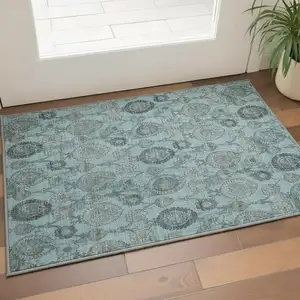 Photo of Turquoise And Gray Damask Washable Area Rug With UV Protection