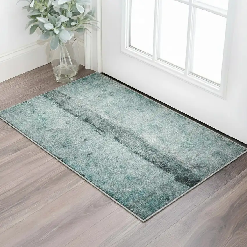 Turquoise And Ivory Abstract Geometric Washable Area Rug With UV Protection Photo 2