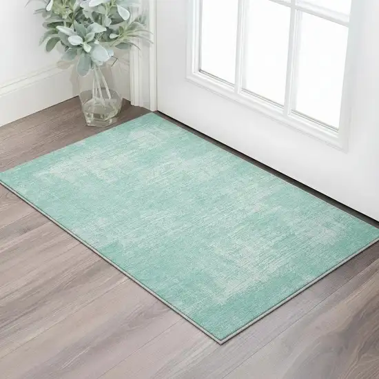 Turquoise And Ivory Abstract Washable Area Rug With UV Protection Photo 2
