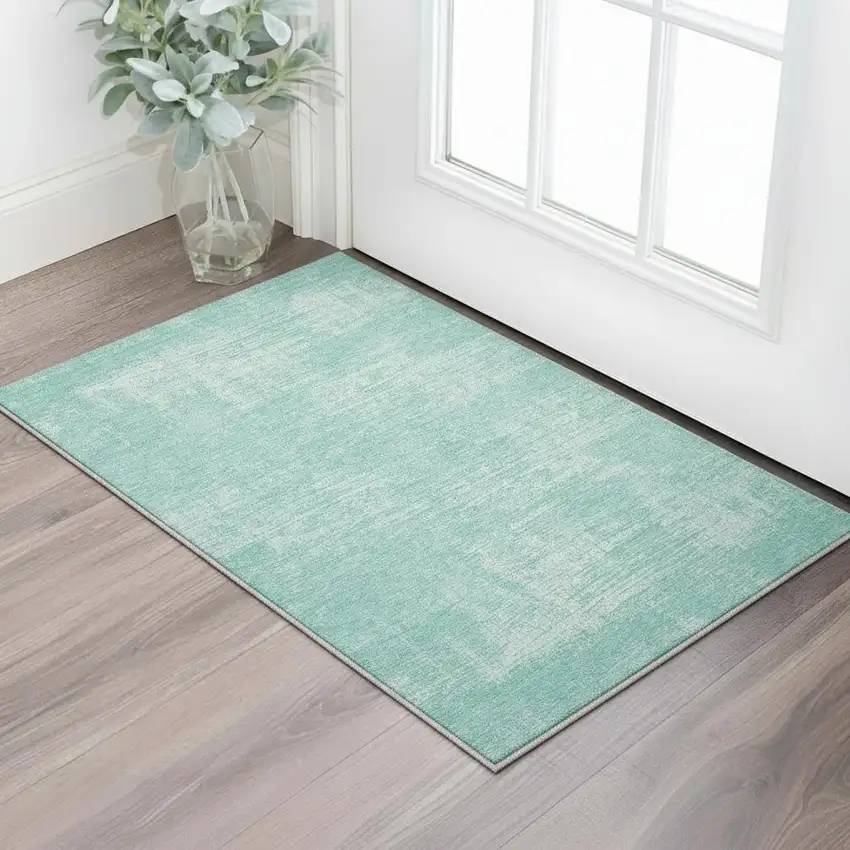 Turquoise And Ivory Abstract Washable Area Rug With UV Protection Photo 2