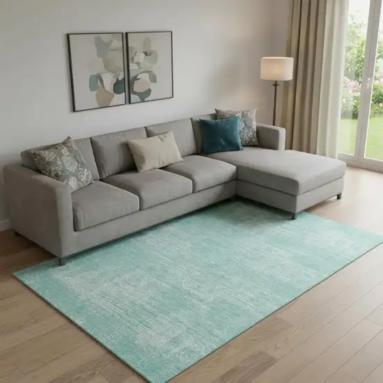 Turquoise And Ivory Abstract Washable Area Rug With UV Protection Photo 1