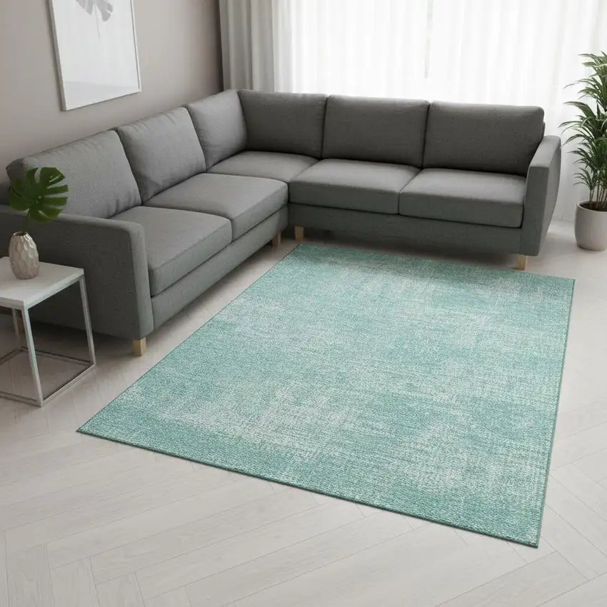 Turquoise And Ivory Abstract Washable Area Rug With UV Protection Photo 2