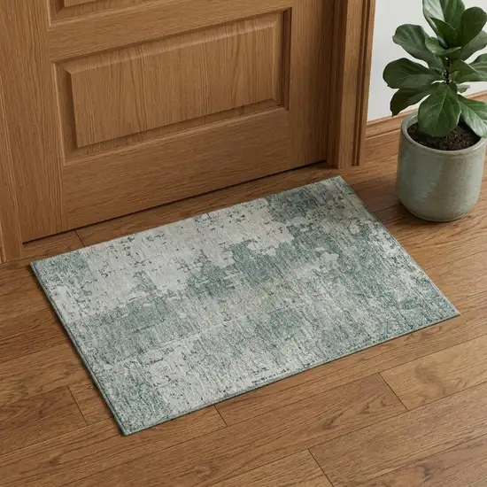 Turquoise And Ivory Abstract Washable Area Rug With UV Protection Photo 1