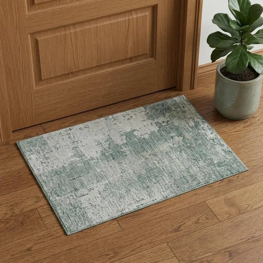 Turquoise And Ivory Abstract Washable Area Rug With UV Protection Photo 1