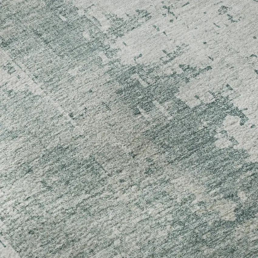 Turquoise And Ivory Abstract Washable Area Rug With UV Protection Photo 1