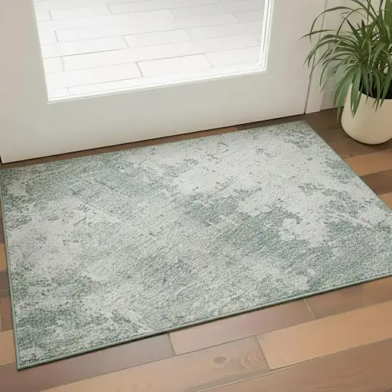 Turquoise And Ivory Abstract Washable Area Rug With UV Protection Photo 2