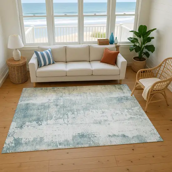 Turquoise And Ivory Abstract Washable Area Rug With UV Protection Photo 4